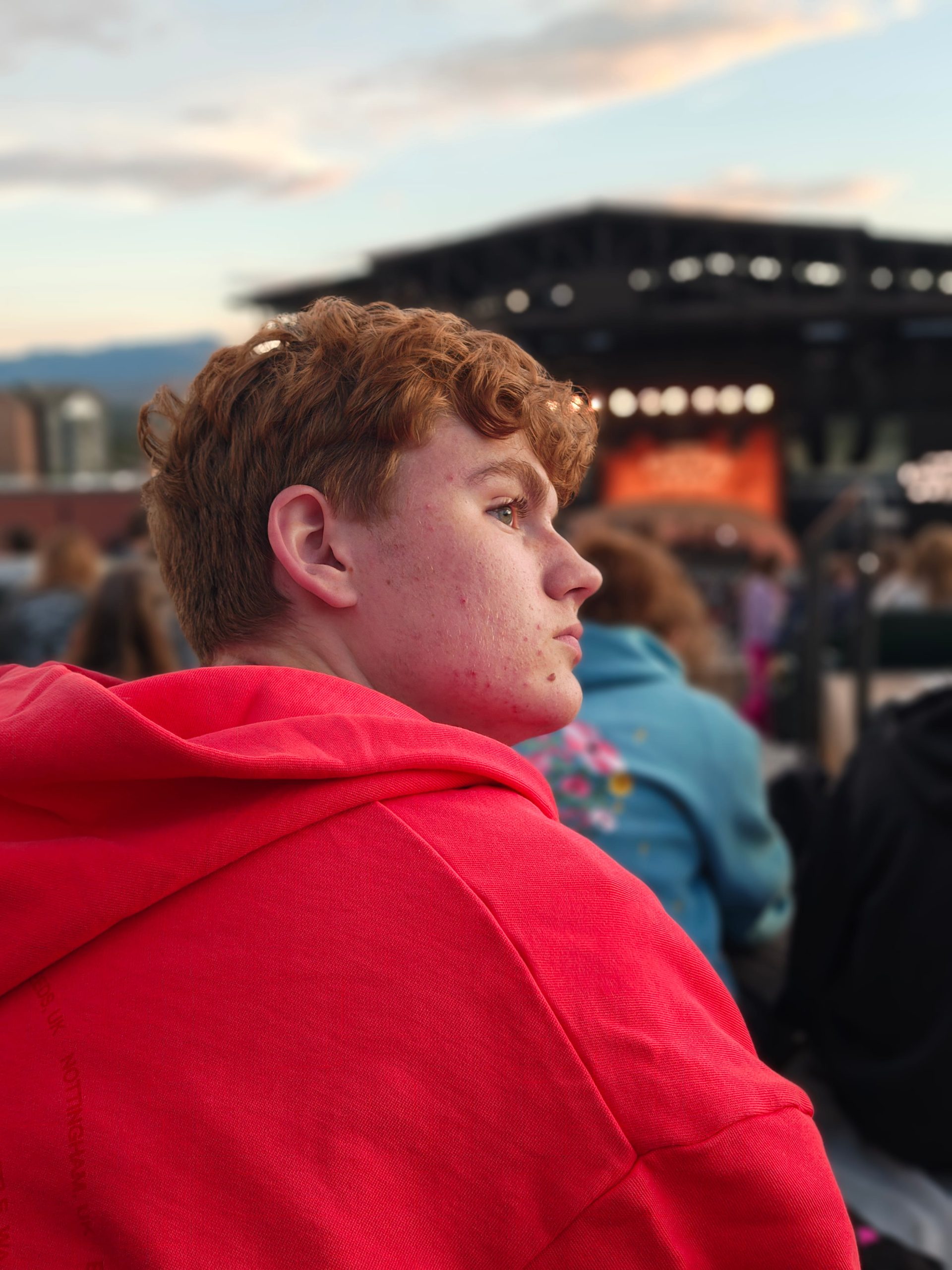 Portrait photos of a family at a restaurant and outdoor concert