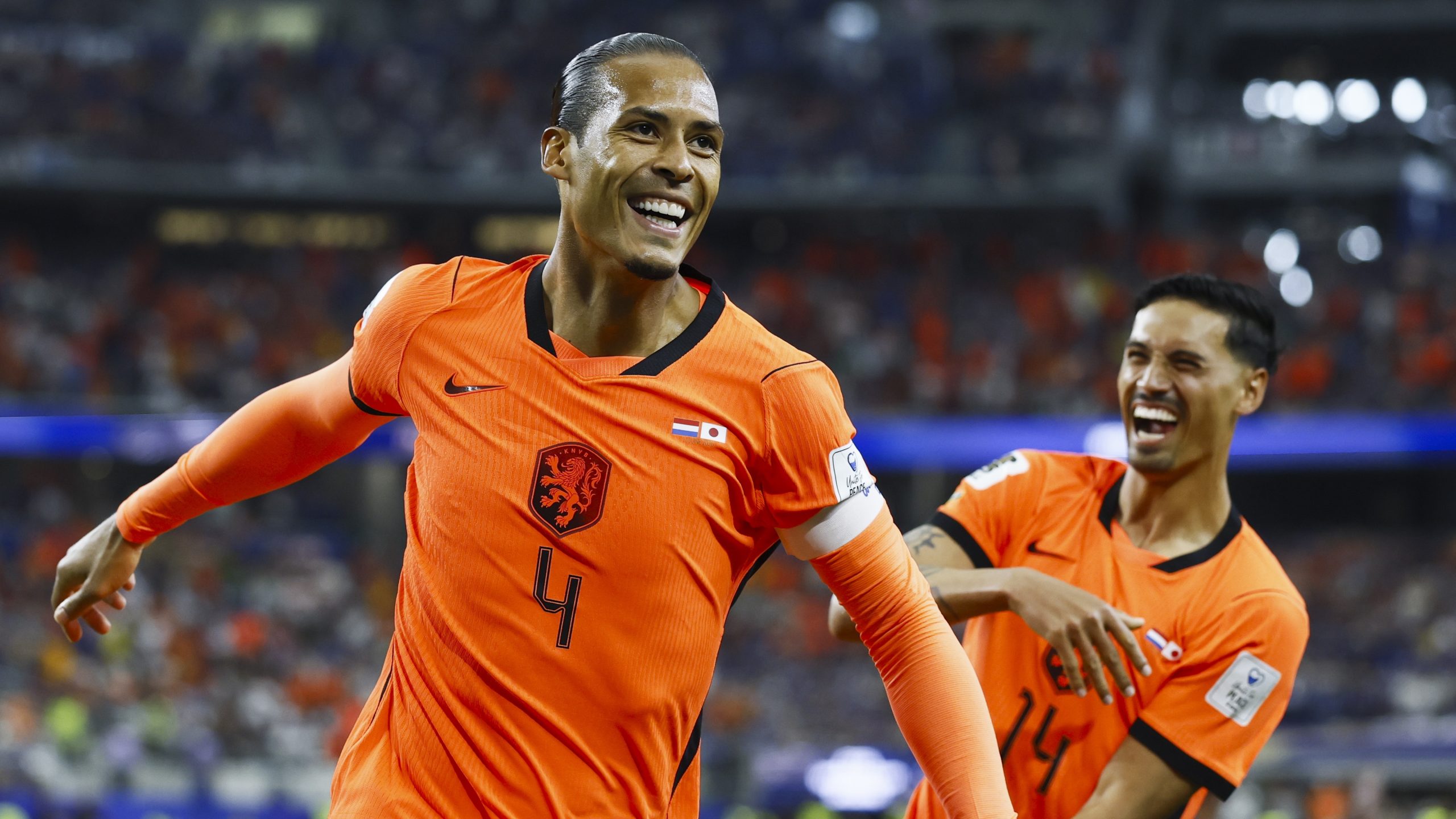 Virgil van Dijk and Tijjani Reijnders of the Netherlands celebrate the 1-0 during the 2026 FIFA World Cup Group F match against Japan at Dallas Stadium on June 14, 2026, in Arlington, United States