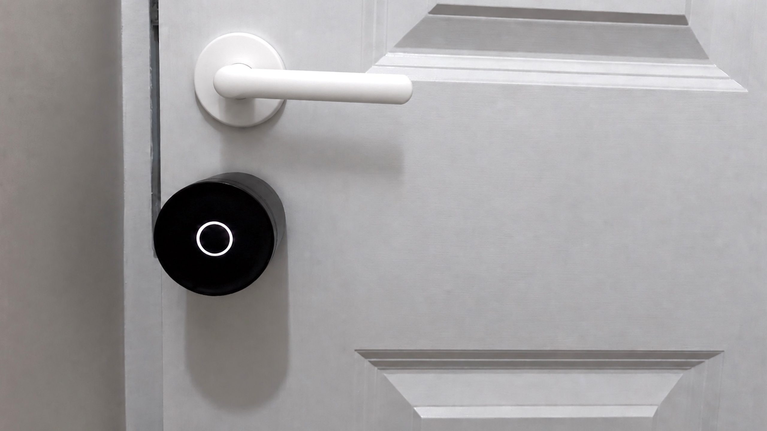 Yale Linus Smart Lock L2 Lite installed on door underneath door handle