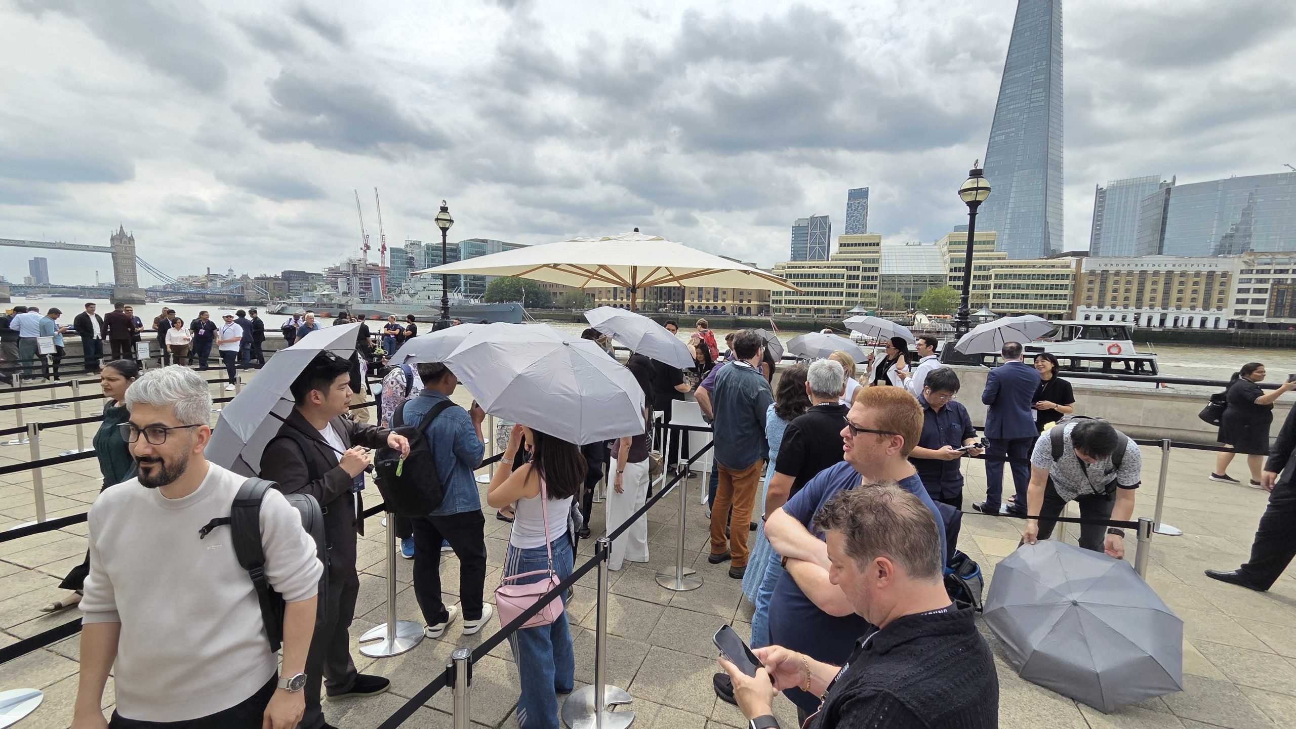 People holding umbrellas at the Samsung Galaxy Unpacked 2026 event