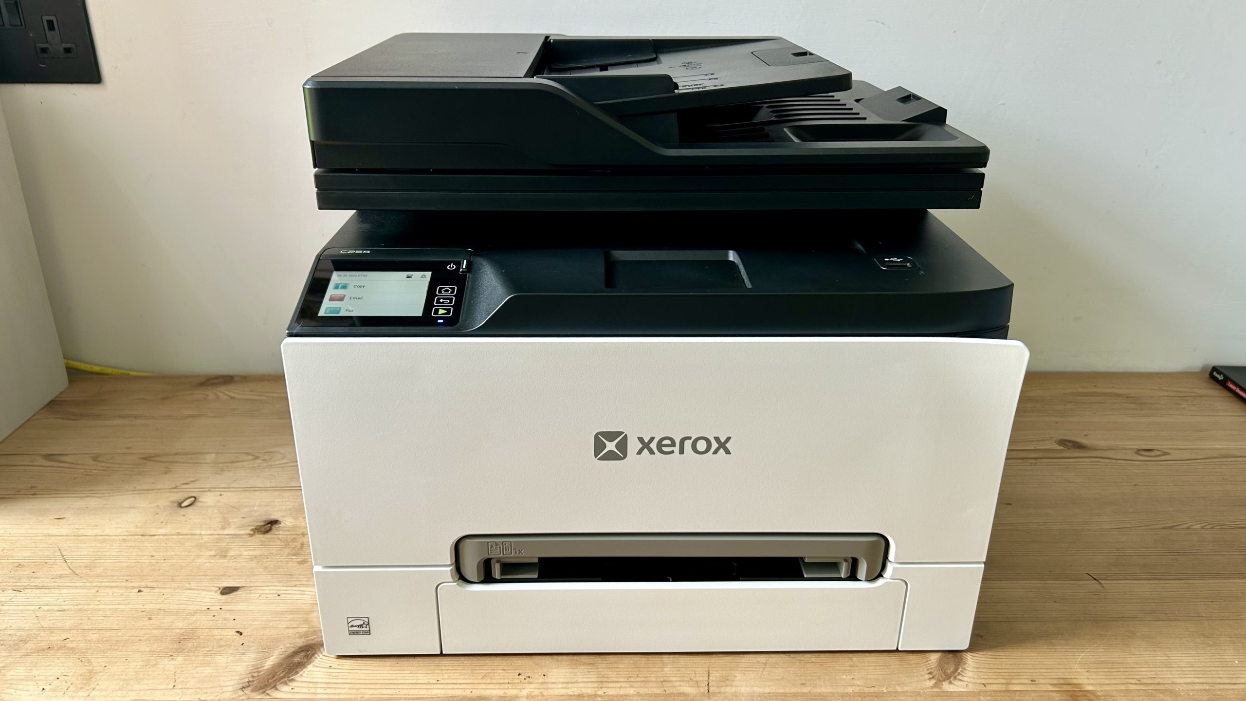 The Xerox C255a on a table in a home office during our tests