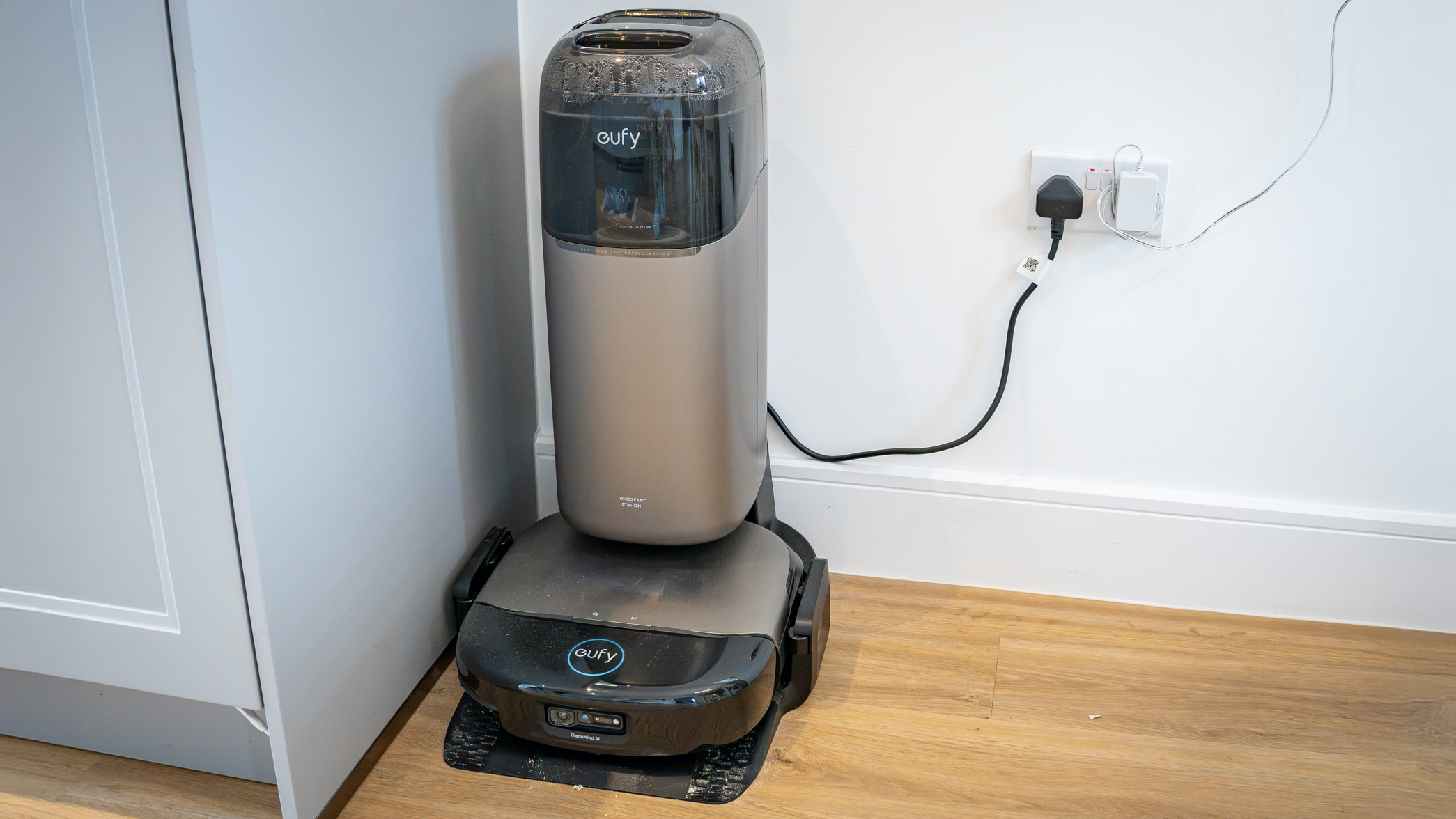 Eufy Omni S2 robot vacuum in dock, plugged in