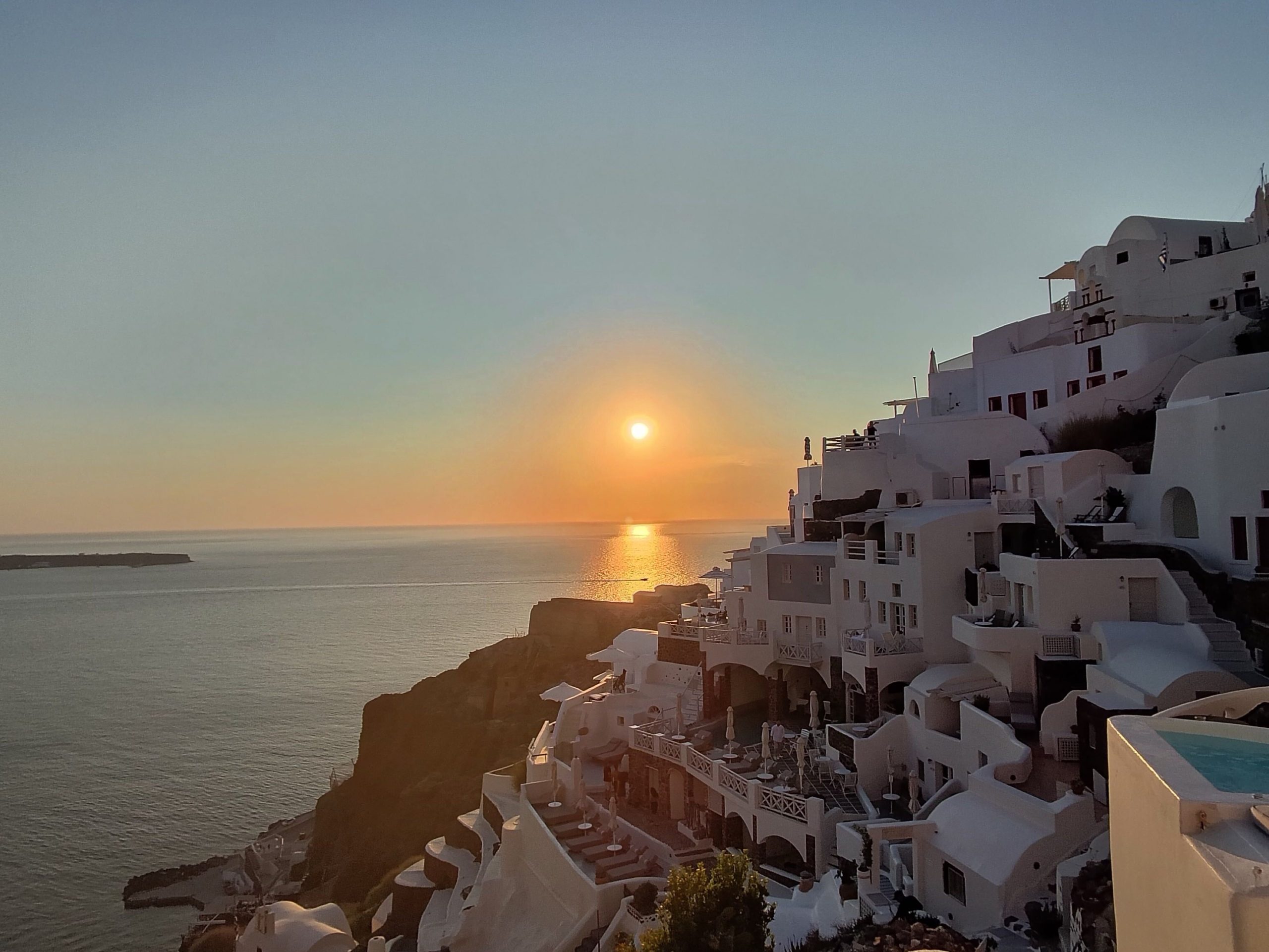 Test shots taken on the L'Atitude 52 smart glasses showing a sunset in Santorini